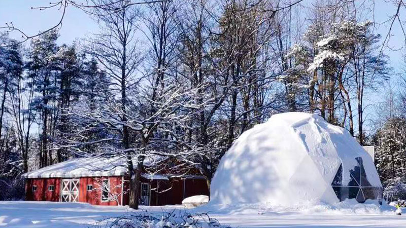 Glamping dome in snow Canada
